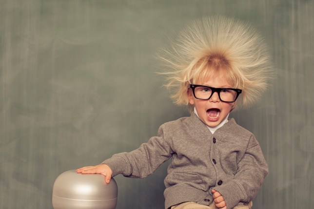 Image of child with hair standing on ends due to static electricity. Source: Getty Images